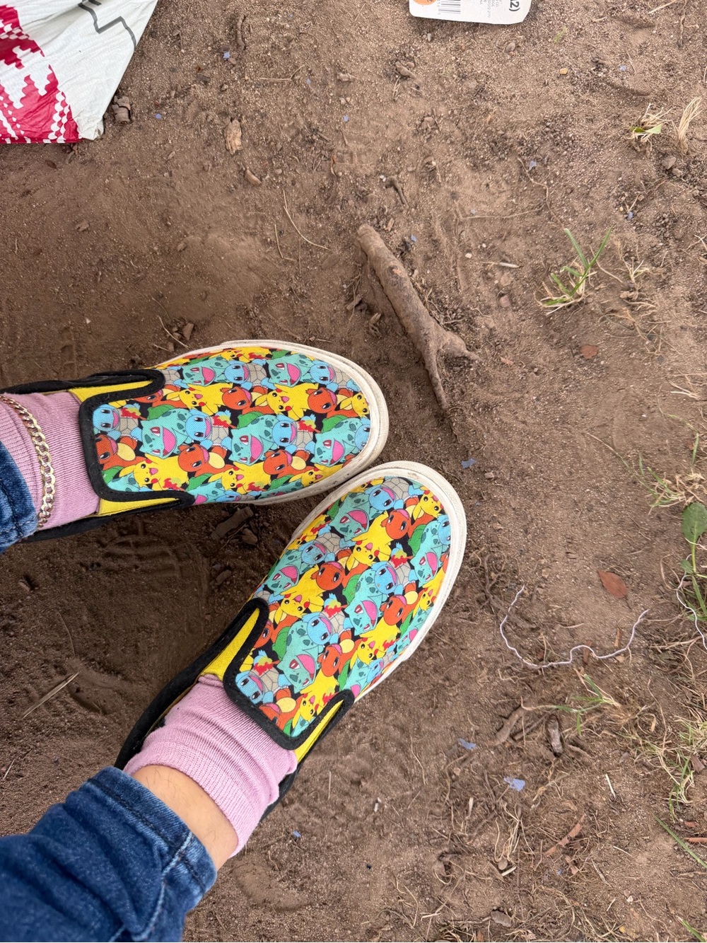 Vans Slip-On Sneakers with Bright Multicolor Cartoon Print